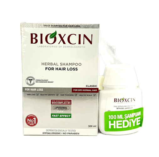 شامپو ضد ریزش گیاهی بیوکسین موهای خشک و نرمال | 300 میل + هدیه 100 میل