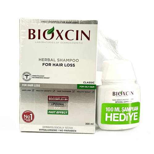 شامپو ضد ریزش گیاهی بیوکسین موهای چرب | 300 میل + هدیه 100 میل